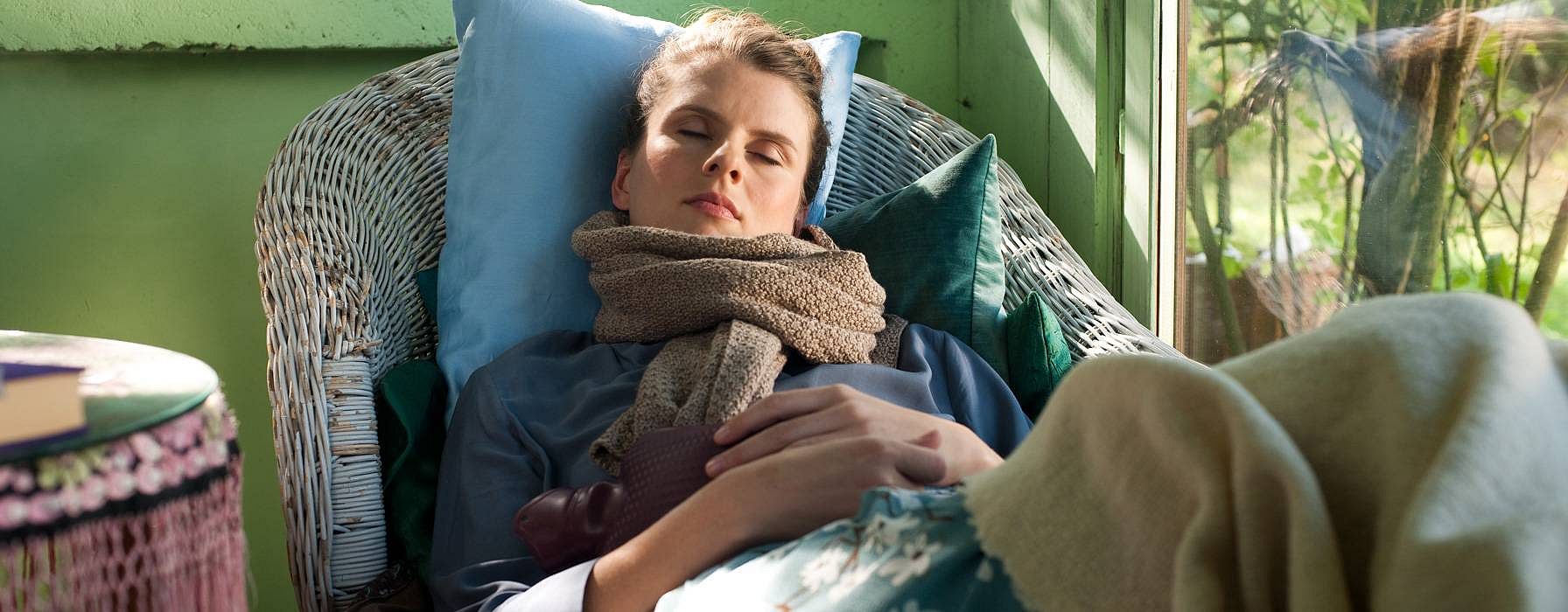 hd_sick_woman_with_hotbottle