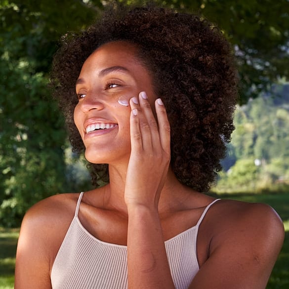 woman touching face