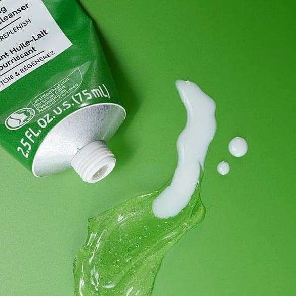 Skinfood cleaning balm tube on green background