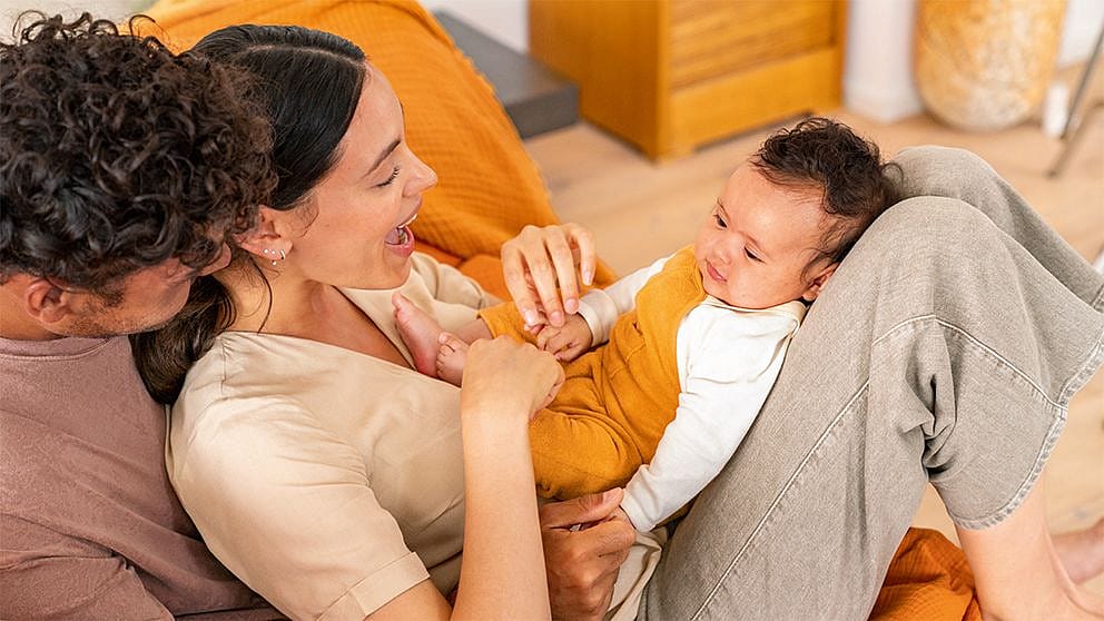 baby-and-parents-playing