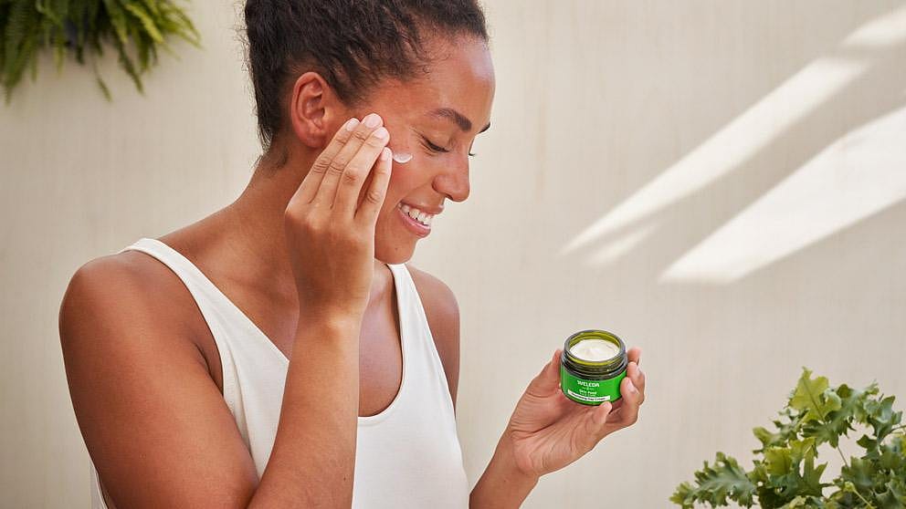 woman applying cream