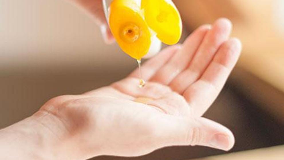sq_baby-oil-in-hand