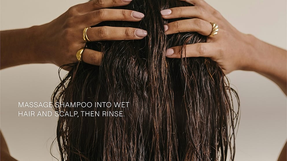 Massage shampoo into wet hair and scalp