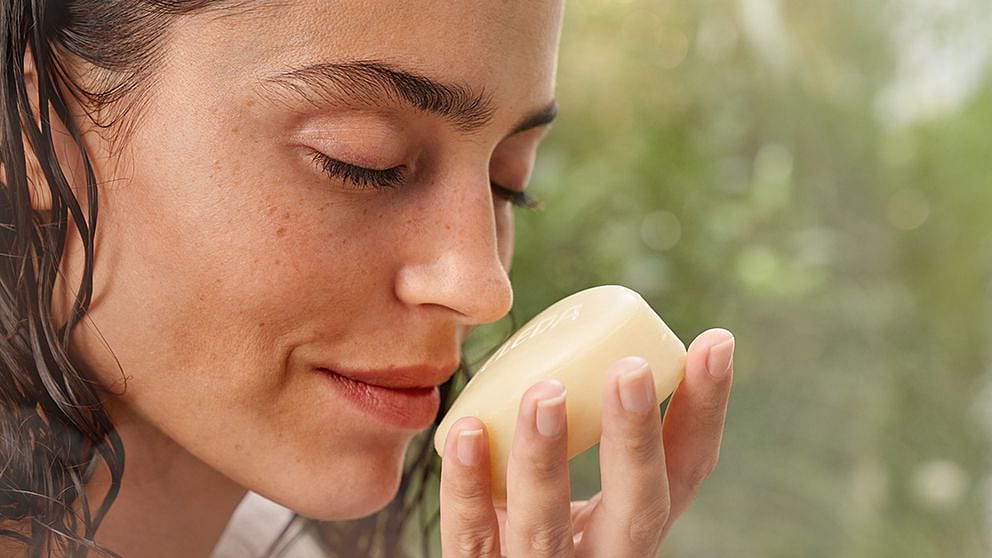 woman_smells_shower_bar.jpg